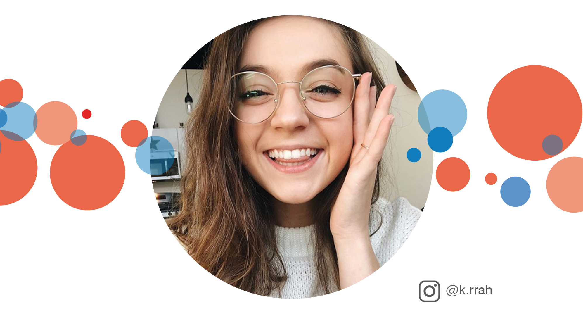 Smiling young woman in round retro glasses