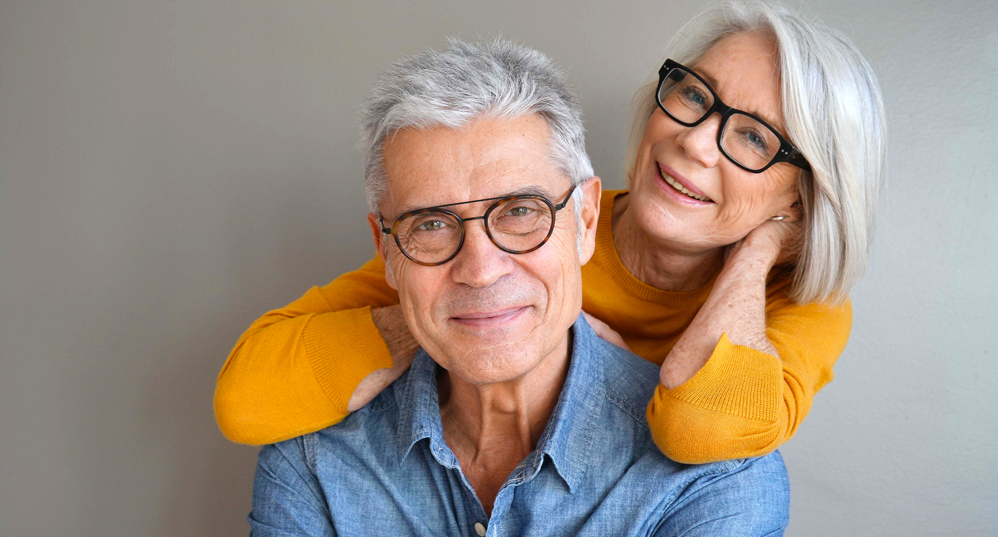 Mature couple wearing glasses	