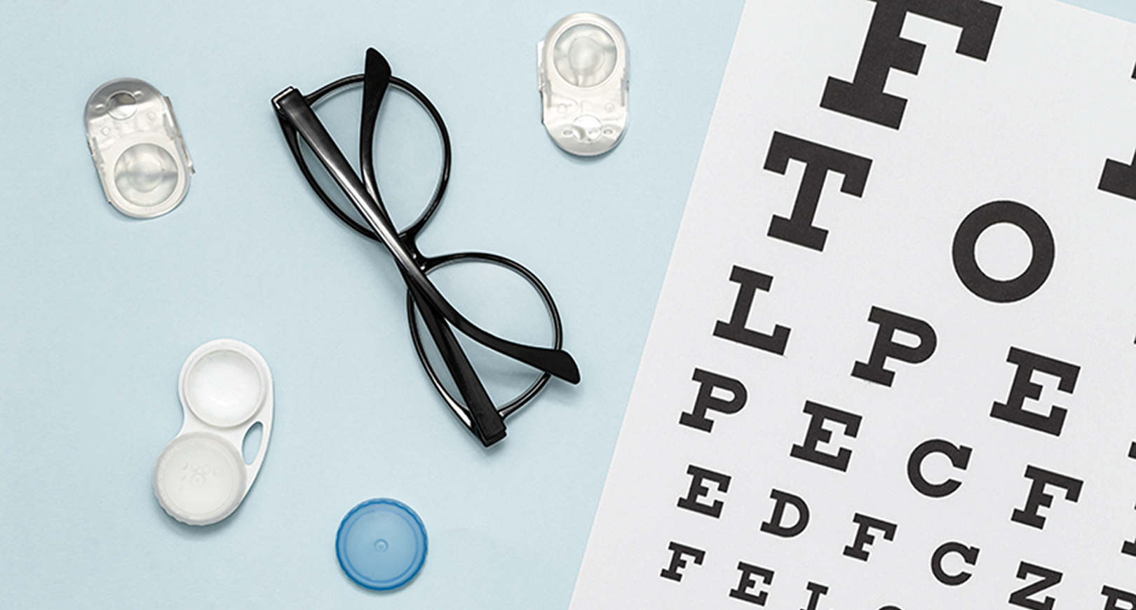 eyeglasses and eye chart Schedule an Eye Exam